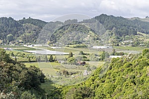 Aerial of Riwaka river valley with large fruit orchards, near Riwaka, Tasman, New Zealand