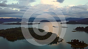 Aerial rotating view during sunrise in Kenyir Lake, Terengganu, Malaysia