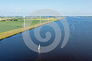 Aerial from sailing on the Eenmeer with windmills in the Netherlands