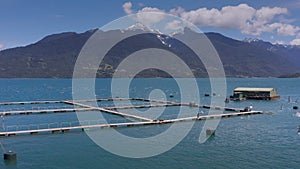 Aerial salmon farms at Reloncavi marine strait at Llanquihue National Park, Chile, South America.