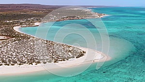 Aerial Sandy bay beach in Ningaloo reef near Exmouth in Western Australia. WA Tourism, recreation and camping concepts.