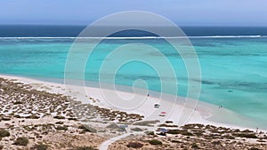 Aerial Sandy bay beach in Ningaloo reef near Exmouth in Western Australia. WA Tourism, recreation and camping concepts.