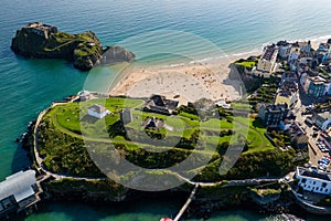 Aerial of a sandy beach in a picturesque resort Castle Beach, Tenby, Wales