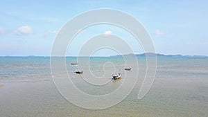 Aerial scene of Nice Thailand Beach with Boats in the Sea,Fly Forward to Blue Sky