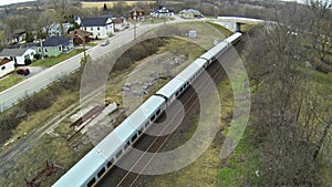 Aerial scene over a passenger train in the country in Paris, Ontario, Canada