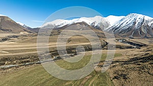 Aerial scenery with a drone over the alpine Castle hill and the ski field area around Porters pass