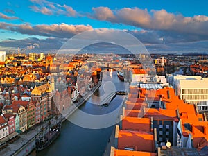 Aerial scenery of the old town in Gdansk over Motlawa river at sunrise, Poland