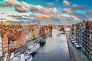 Aerial scenery of the old town in Gdansk over Motlawa river at sunrise, Poland