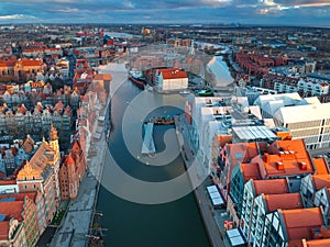 Aerial scenery of the old town in Gdansk over Motlawa river at sunrise, Poland