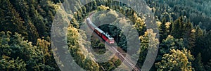 Aerial scenery of train with wagons in mountain landscape