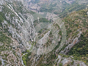 Aerial scenic view from over the famous Ridomo gorge in Taygetus Mountain. The Gorge is deep and rich in geomorphological