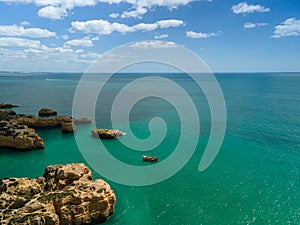 Aerial seascape of Algarve coast  a popular beach destination . Portugal