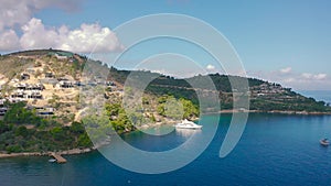 Aerial seaview the marina blue lagoon and luxury white yacht in Torba, Bodrum, Turkey. Aerial view 4K.