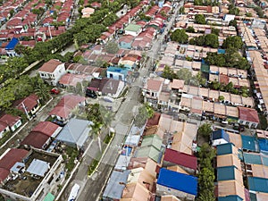 Aerial of serveral subdivisions of rowhouses for low to middle income families. At Naic, Cavite, Philippines