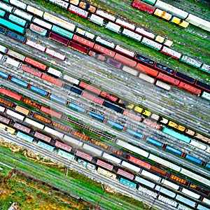 Aerial shoot of railway tracks with lots of wagons