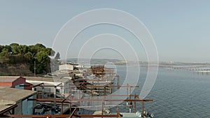 Aerial shooting of the old fishing docks near Sete city on lake Etang de Thau