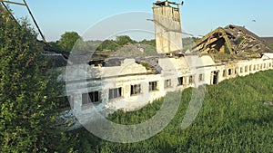 Aerial shot of an abandoned cattle barn.