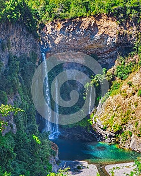 Aerial shot of an amazing waterfall in Radal Siete Tazas National Park, Chile photo