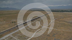 Aerial shot of Amtrak train and desert town