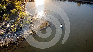 Aerial shot of bass fisherman fishing shallow point on lake Eufaula Oklahoma.