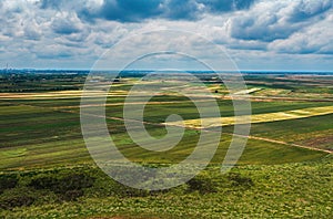 Aerial shot of beautiful countryside landscape with cultivated fields in Banat, geographical region of Vojvodina province in