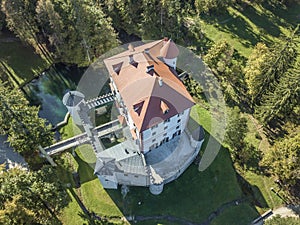 Aerial shot of the beautiful Grad SneÅ¾nik white castle in Slovenia