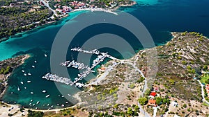 Aerial shot of a beautiful harbor in Ormos Panagias, Sithonia, Halkidiki, Greece