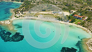 Aerial shot of a beautiful landscape of the Lagonisi beach in Sithonia Halkidiki, Greece photo