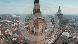 Aerial shot of the bell tower of Santa Maria del Carmine church in Pavia, Italy