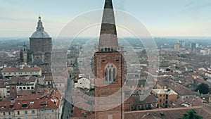 Aerial shot of the bell tower of Santa Maria del Carmine church in Pavia, Italy