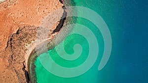 Aerial shot of blue-green waters in Isla del Espiritu Santo, Baja California Sur, Mexico photo