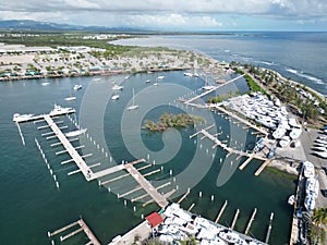 Aerial shot of the boats parked in the harbor in the city