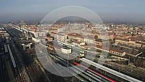 Bologna Centrale railroad station and tracks and city, Italy. Aerial shot photo