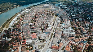 Aerial shot of the Brcko district full of tiny buildings on a sunny day