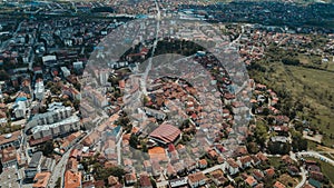 Aerial shot of the Brcko district full of tiny buildings on a sunny day