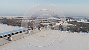 Aerial shot of bridge and car driving on the bridge