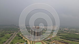 Aerial shot of a building under construction. 4k indian stock video of dwarka express way under construction