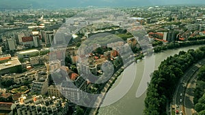 Aerial shot of the central railway terminus and Europole district in Grenoble and the Isere River, France