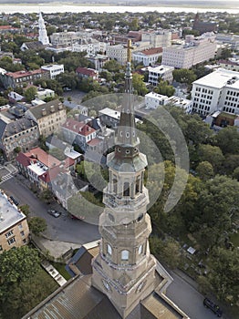 Aerial shot of the city of Charleston, South Carolina with the steeple of St Philips church in the foreground photo