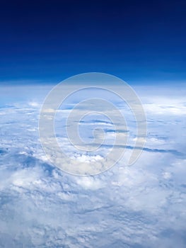 Aerial shot of cloudscape from airplane pov