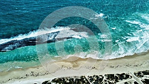 Aerial shot of coastal waves, yanchep lagoon