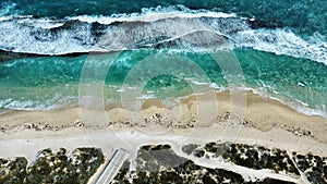 Aerial shot of coastal waves, yanchep lagoon