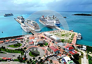 Aerial shot of cruise ships docking at the Harbor Pointe Village of Sint Maarten in the Caribbean
