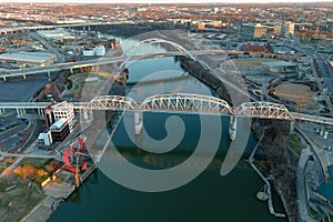 Aerial shot Cumberland River with the John Seigenthaler Pedestrian Bridge and the Korean Veterans Memorial Bridge over the water