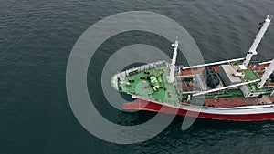 Aerial shot of a dry cargo ship in the sea