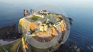 Aerial shot of the Dunnottar Castle in Stonehaven, Scotland