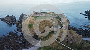 Aerial shot of the Dunnottar Castle in Stonehaven, Scotland