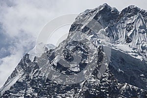 Aerial shot of Everest (Chomolungma) the highest mountain from sea level covered by snow in Nepal