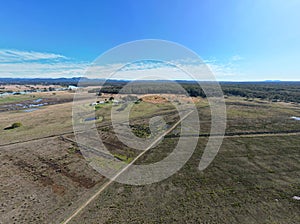 Aerial shot of a field in Blackman Point in Port Macquarie, New South Wales, Australia