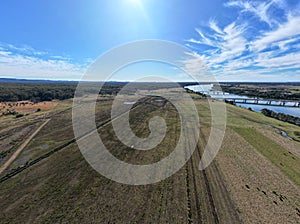 Aerial shot of a field in Blackman Point in Port Macquarie, New South Wales, Australia